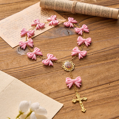 Różaniec z różową kokardką Matki Bożej z Guadalupe: Nieś Jej delikatne błogosławieństwa